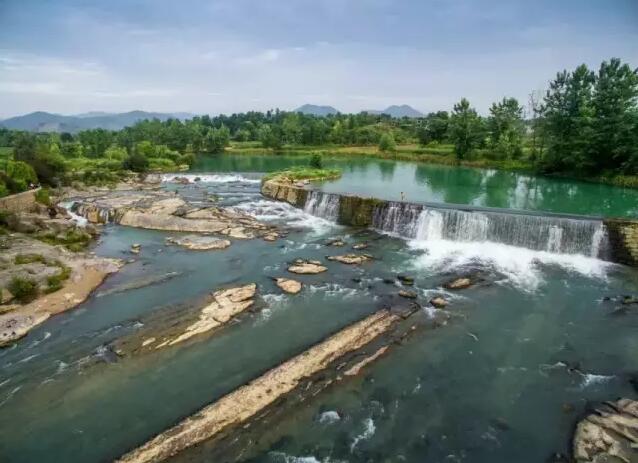 旅游 正文  地道农庄欢迎您千年古堰湾千年古堰——石枧堰,因石圳如枧