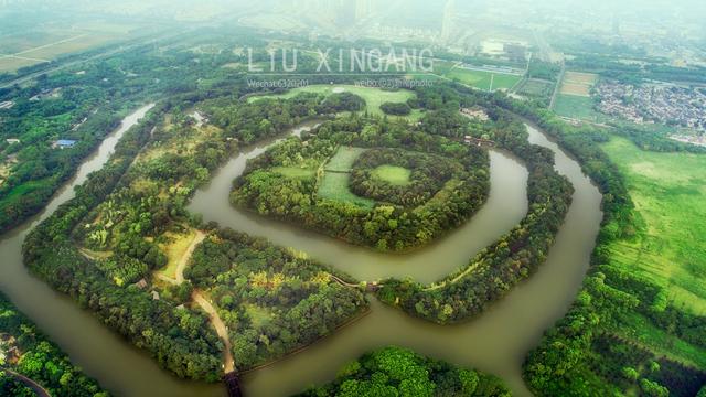 旅游 正文 上图,淹城也是我国唯一一座三城三河形制的古地面城池遗址.