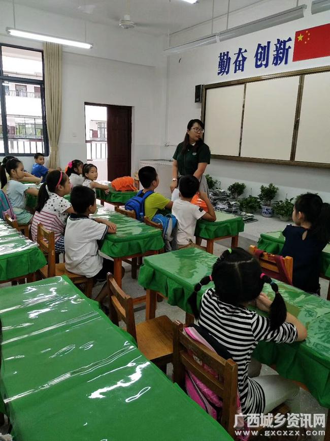 柳州市胜利小学组织家长学生参观新校园