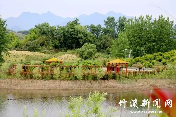 旅游 正文  龙湖国家湿地公园前身是竹溪河水库(又称龙坝水库),始建于