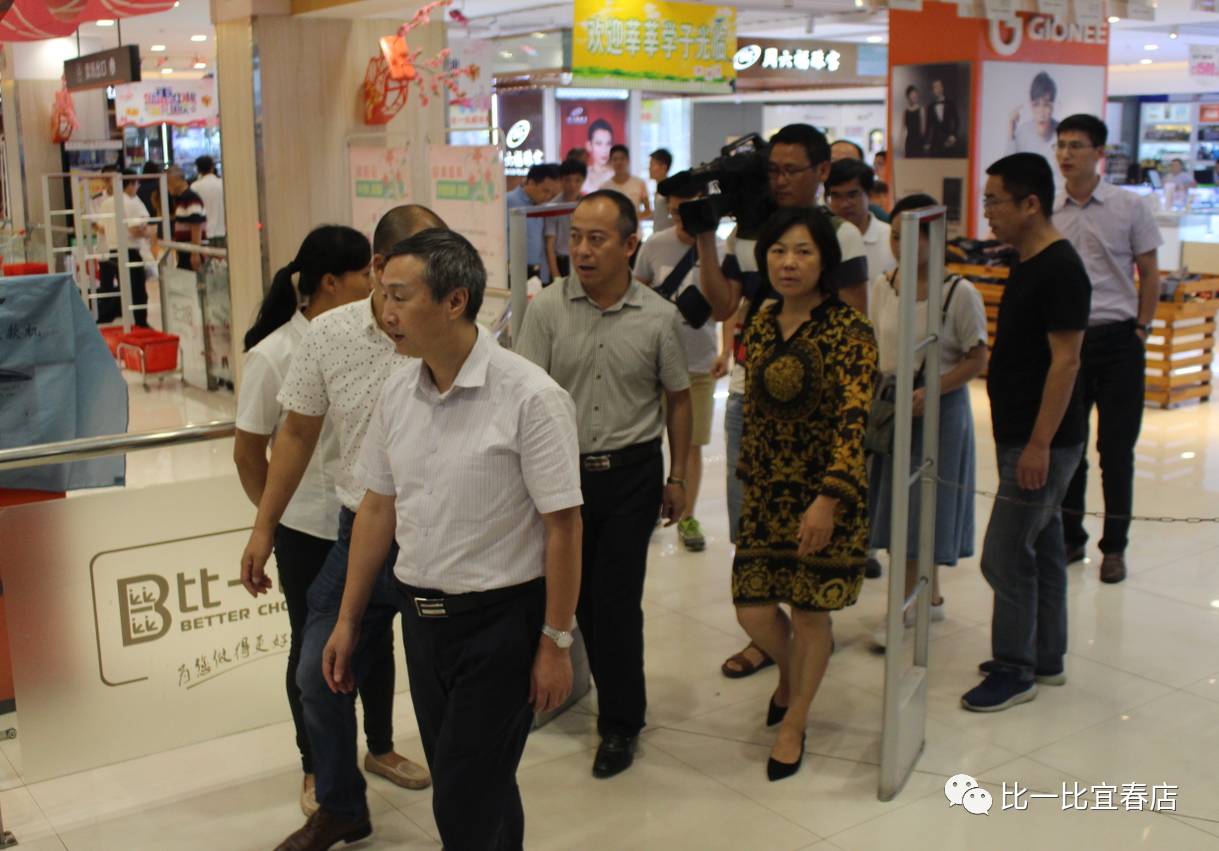 江西省粮食局总工程师廖小平,宜春市副市长兰亚青等一行莅临我店视察