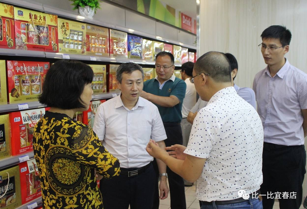 江西省粮食局总工程师廖小平,宜春市副市长兰亚青等一行莅临我店视察