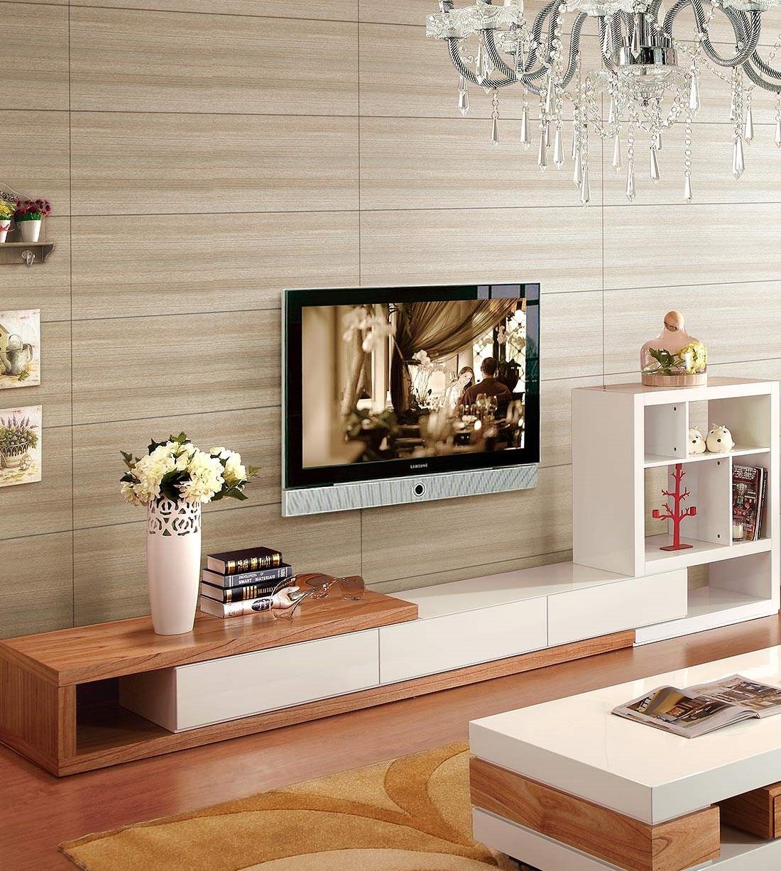 模拟电视柜在现代客厅与蓝色扶手椅和植物在白色的墙背景。照片摄影图片_ID:408813137-Veer图库