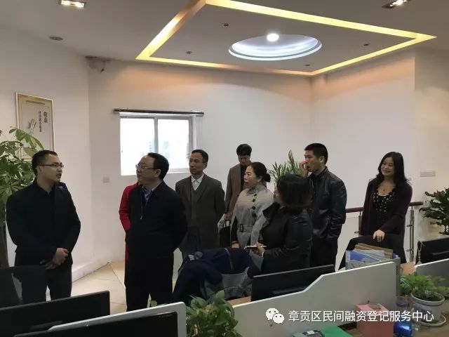 赣州市市委副秘书长李国泉一行莅临章贡区民融登指导交流工作