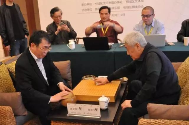 弈经,准备请那时中国围棋界资格最老德高望重的陈祖德,王汝南,罗建文