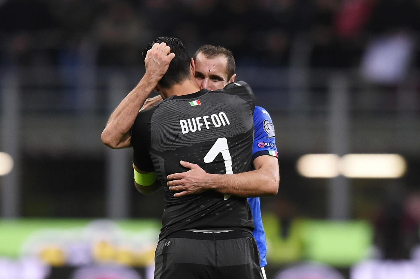 Juventus' Gianluigi Buffon walks past the UEFA Champions League trophy ...