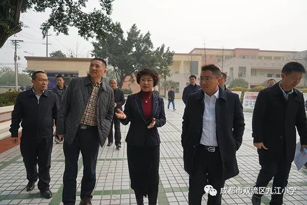 双流区人民政府副区长曾虎,教育局局长李光纯,九江街道党工委书记袁甫