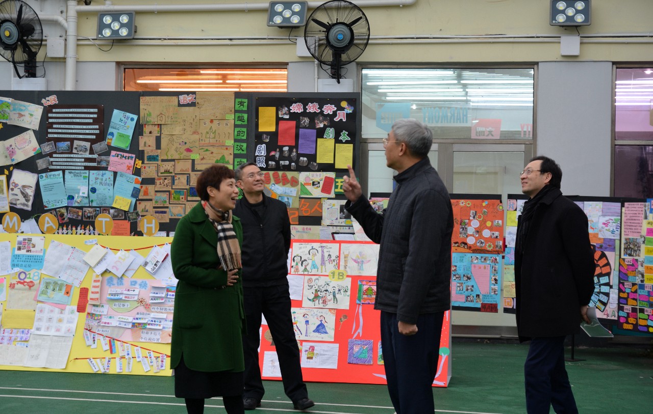 市委副书记尹弘关心民办教育冒雨走访爱菊小学