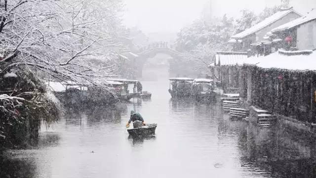 罕见的丽江雪,到底多"冷艳?雪后的古镇,美成了天堂