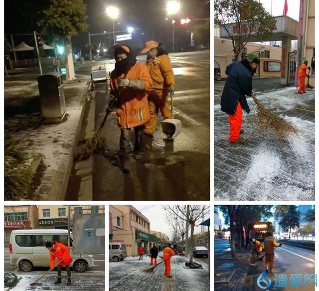 为防行人摔倒,穿着雨靴铲冰雪的保安大叔