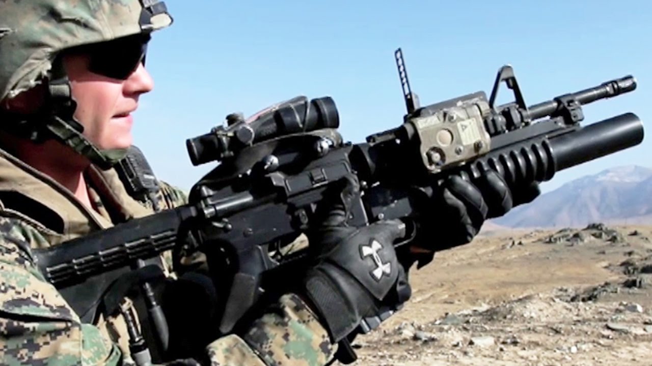 携带挂装了m203榴弹的m4a1步枪是伊拉克战争中美军的"标准像"