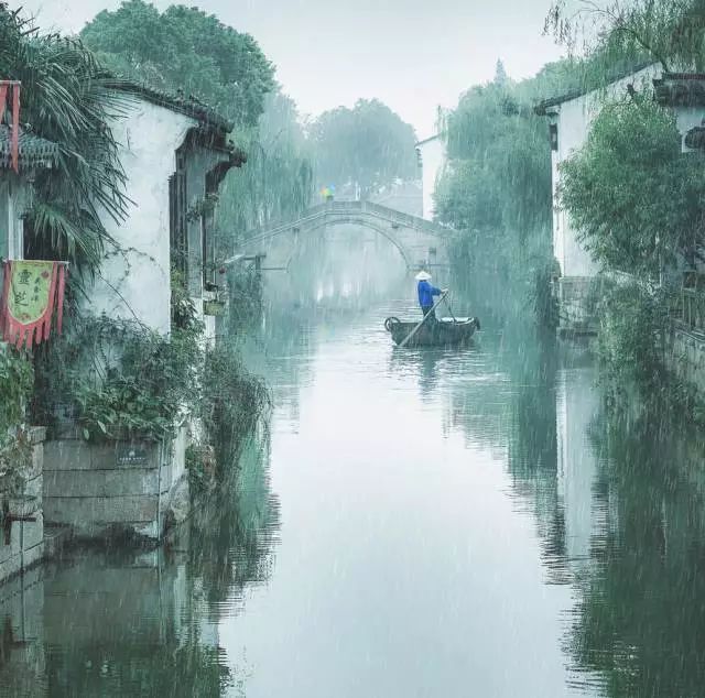 "烟雨蒙蒙的天气,倒是与南浔水乡景致相得益彰.