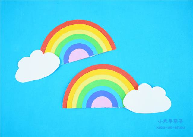 七彩卡纸,白纸,胶水,剪刀卡纸彩虹云朵摆成一个