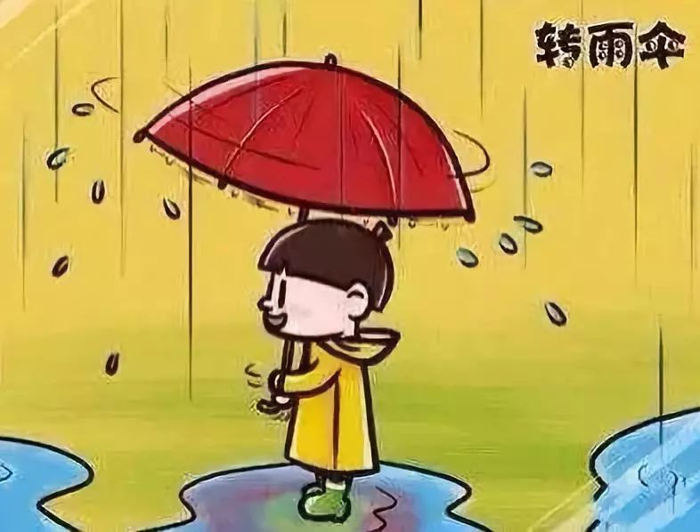 下雨天,陶醉的旋转手中的雨伞.