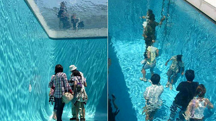 日本这个游泳池人穿衣服在水下走却不会被打湿怎么回事