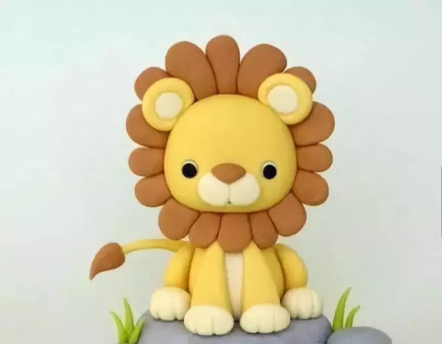 粘土制作小狮子2 这款粘土小狮子用到的超轻粘土有:黄色,肉色,棕色