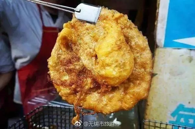 王兴记,穆桂英美食等 鸡子大饼 鸡蛋葱油饼又称鸡子大饼,是江苏无锡