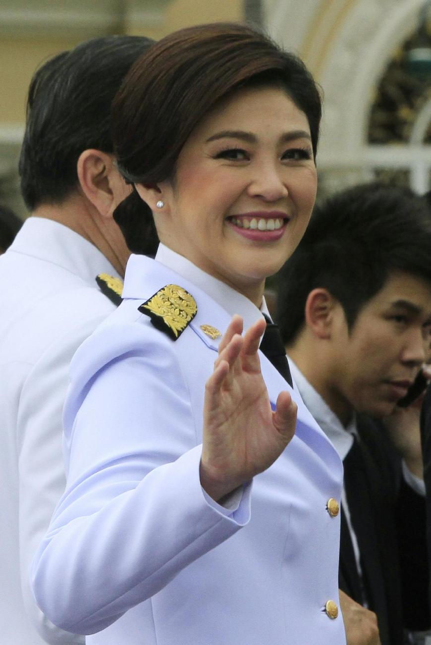 泰国前美女总理英拉又来中国了依然是英姿俊俏眉目含笑