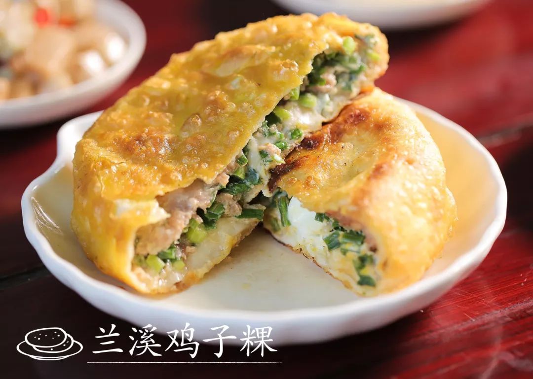 金华兰溪有一种蛋饼叫" 鸡子馃",和北方的鸡蛋灌饼相似,将调了味的