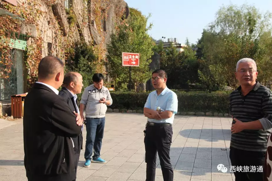 10月5日,西峡县旅游局局长张智勇同志,副局长王金营同志带领各科室