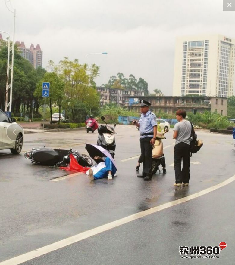 今天,钦州市区发生多起车祸,一女子在斑马线旁被撞翻滚