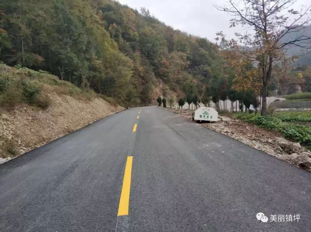 我县又一条乡村柏油路改建完成_建设