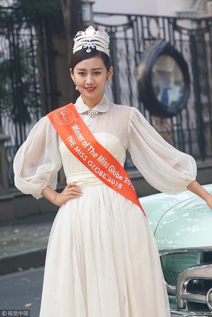 中国选手首夺环球小姐总冠军 一袭白裙仙气满满