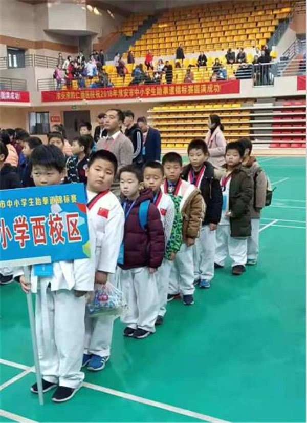 周恩来红军小学西校区参加2018年淮安市跆拳道锦标赛荣获金奖 图5