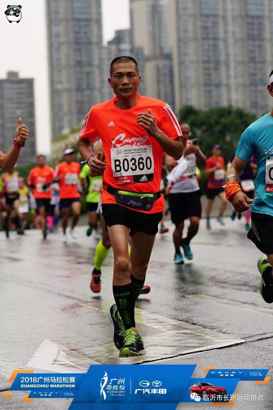 史上最冷广马心中有梦想何惧风雨狂跑遍羊城跨过珠江