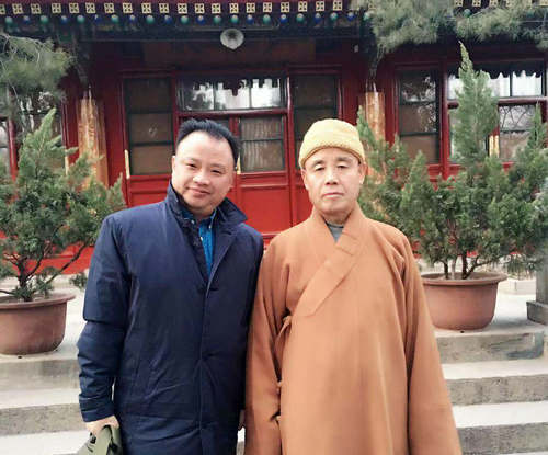 交流结束后,阮先锋与广济寺方丈演觉大和尚合影留念