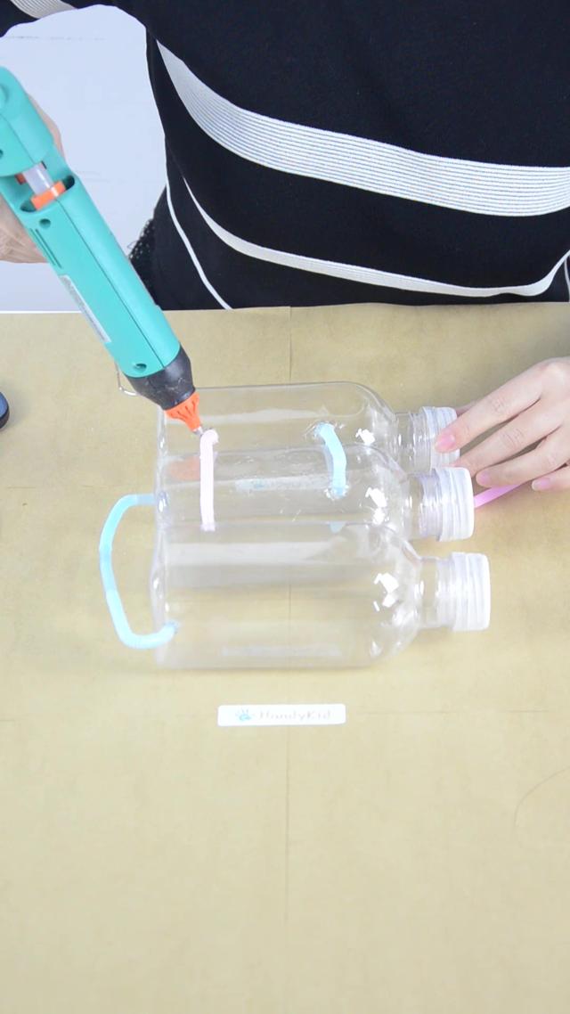 diy希罗喷泉用塑料瓶和吸管带孩子做一个彩色喷泉