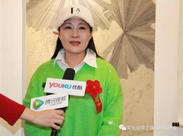 解放军总医院杏林书画院原常务副院长罗沈茹女士(下图二;中央政府