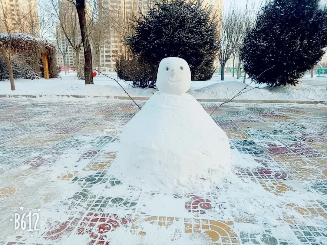 哈哈~成功的雪娃娃这造型太别致啦!