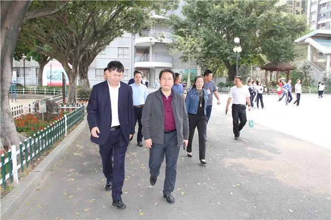 光明区人民政府教育督导室毛付雄主任,光明区高级中学宋绍鹏校长,李佳