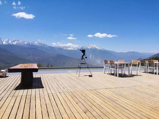 乘车前往中罗村山顶观景平台,采风玉龙雪山,哈巴雪山壮丽美景; >>>