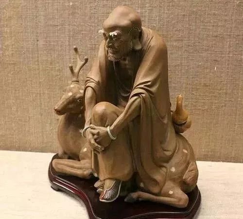 二十多年坚持纯手工木雕、泥塑,天门这位80后