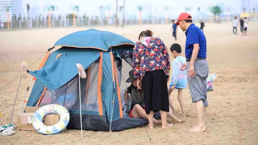 家门口的“十里金沙滩”亮相央视!阳光、海浪、沙滩。。。 博狗开户官网