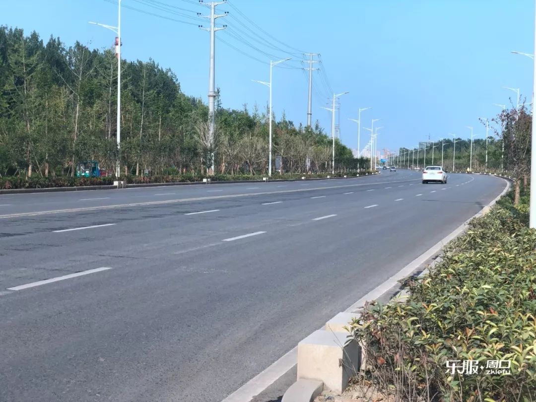 周口北环惊现超高颜值道路,双向8车道还自带坡式园林