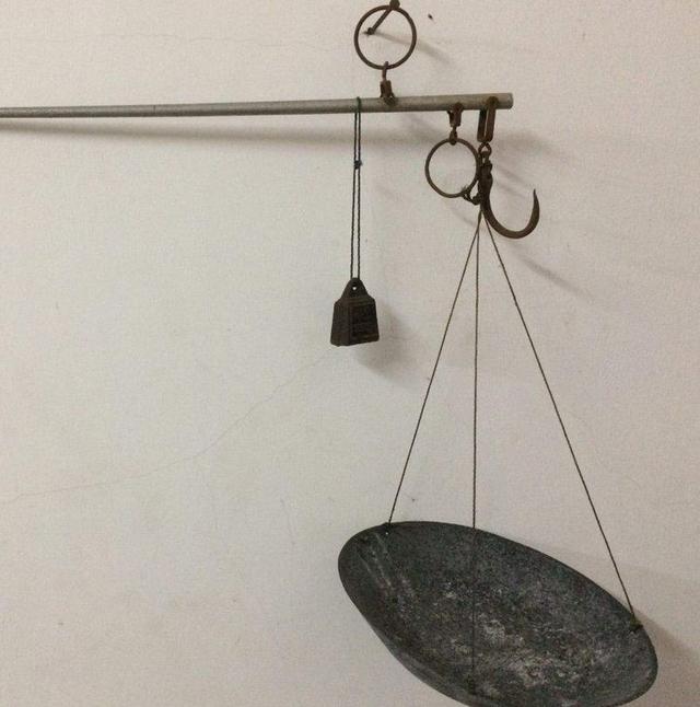 用一杆老秤发家致富,博白这位农民做到了