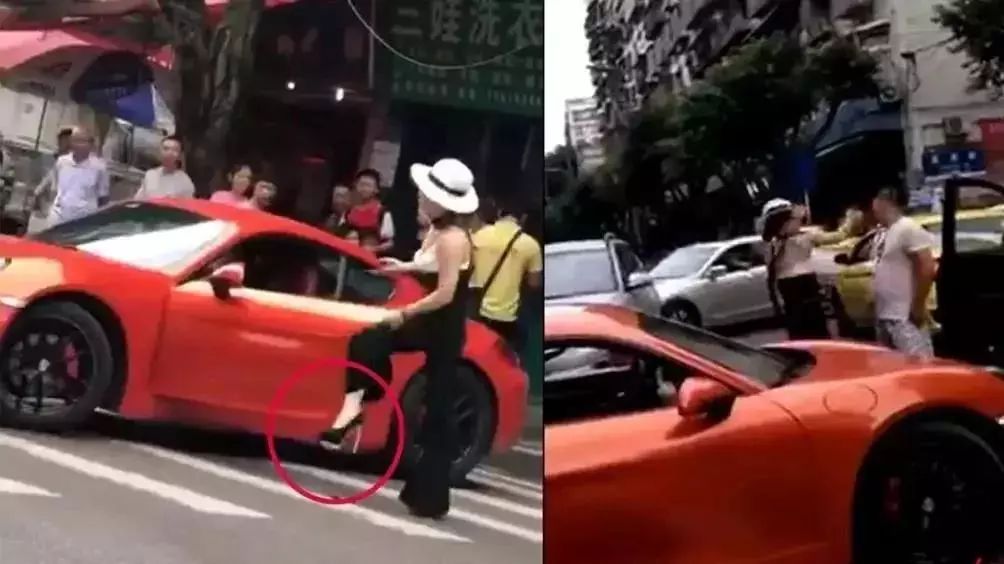 逆行撞人后挥伞就打!网友:自行车版保时捷女司机