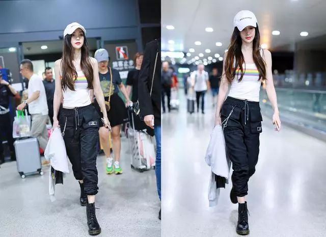 Angelababy马丁靴,angelababy礼服 angelababy太帅了机场搭心机背心工装裤马丁靴网友太敢穿
