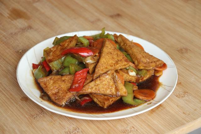 炖豆腐怎么让豆腐入味嫩 8c212683c53f4e51bbe7fa2960fca592.jpeg