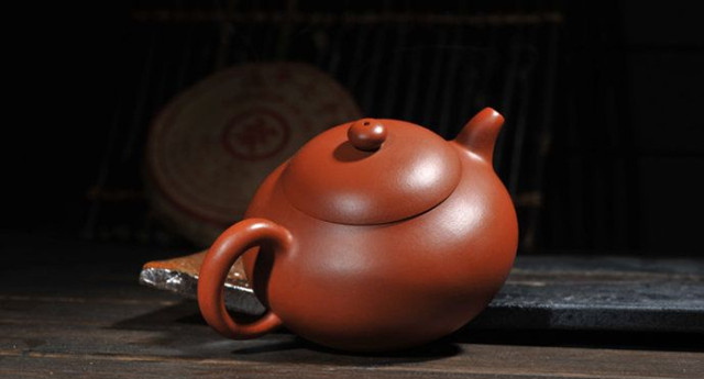 怎么选好一把好的紫砂壶 7b49a614ca9f4c52adf23c280eec0054.jpeg