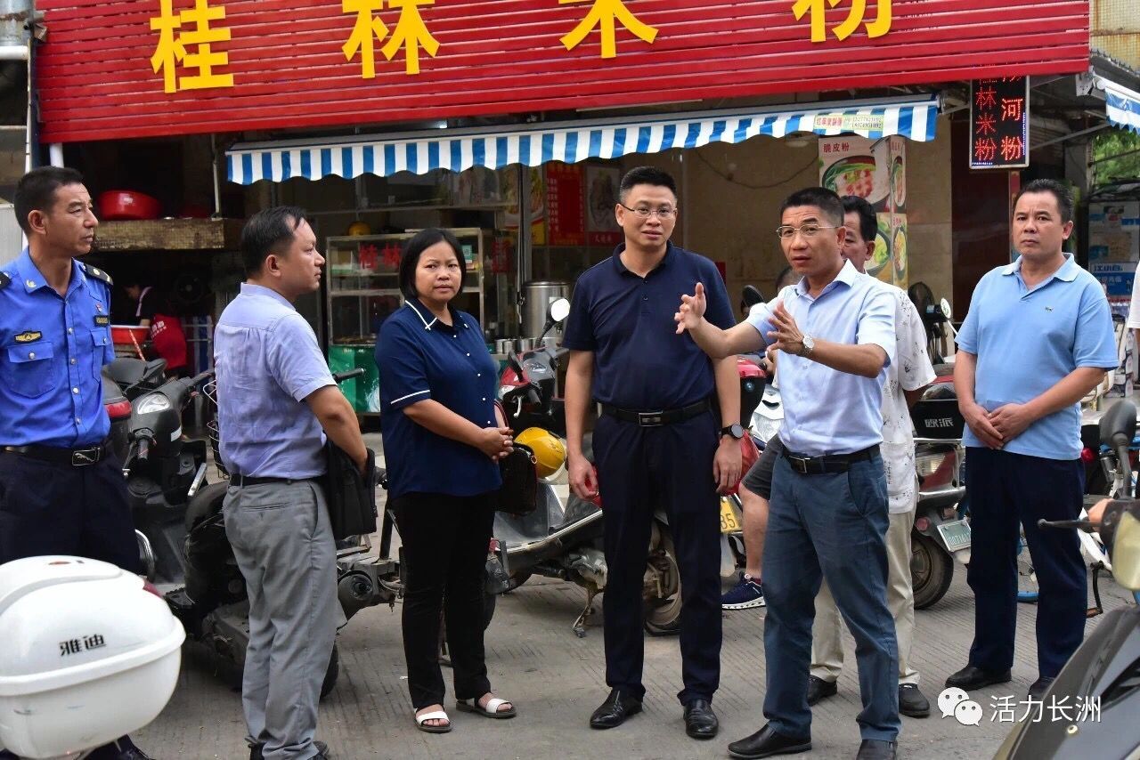 尹哲率队到新龙市场实地走访调研