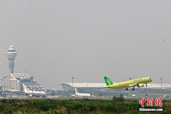 中国C919大型客机104架机顺利转场ARJ21新增105架订单