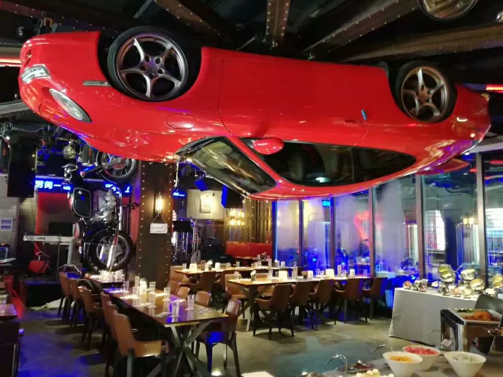 汽车主题餐厅设计效果图_土巴兔装修效果图
