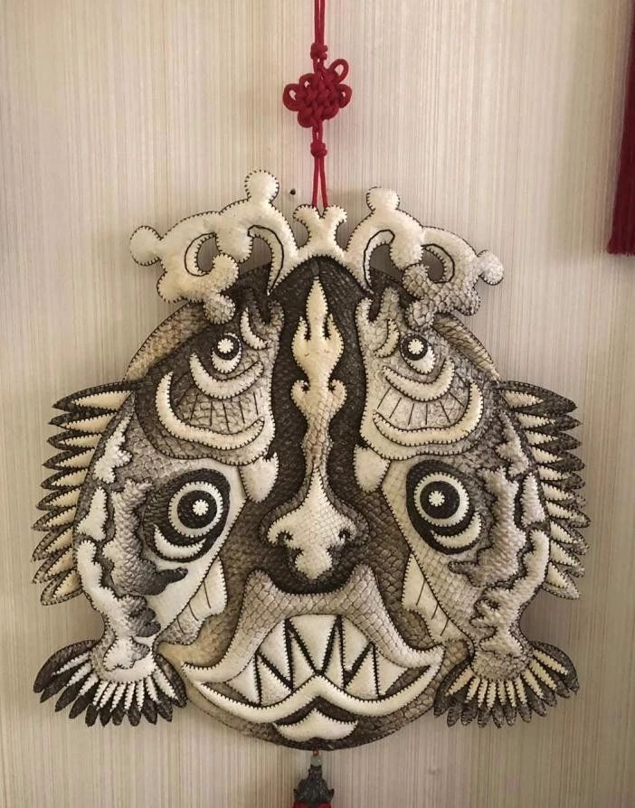 独特精美的鱼皮画带我们领略赫哲族的民俗文化