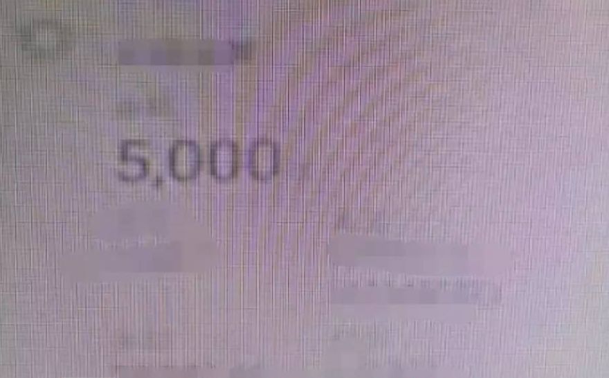 柳州一取款机吐出5000元现金,要男子的相机急单反技巧拍照取钱图片