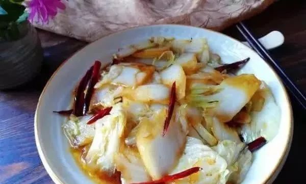 酸辣白菜怎么炒好吃家常做法 d9b276d3d0dc47fc8db7edd0d4f44cc0.jpeg