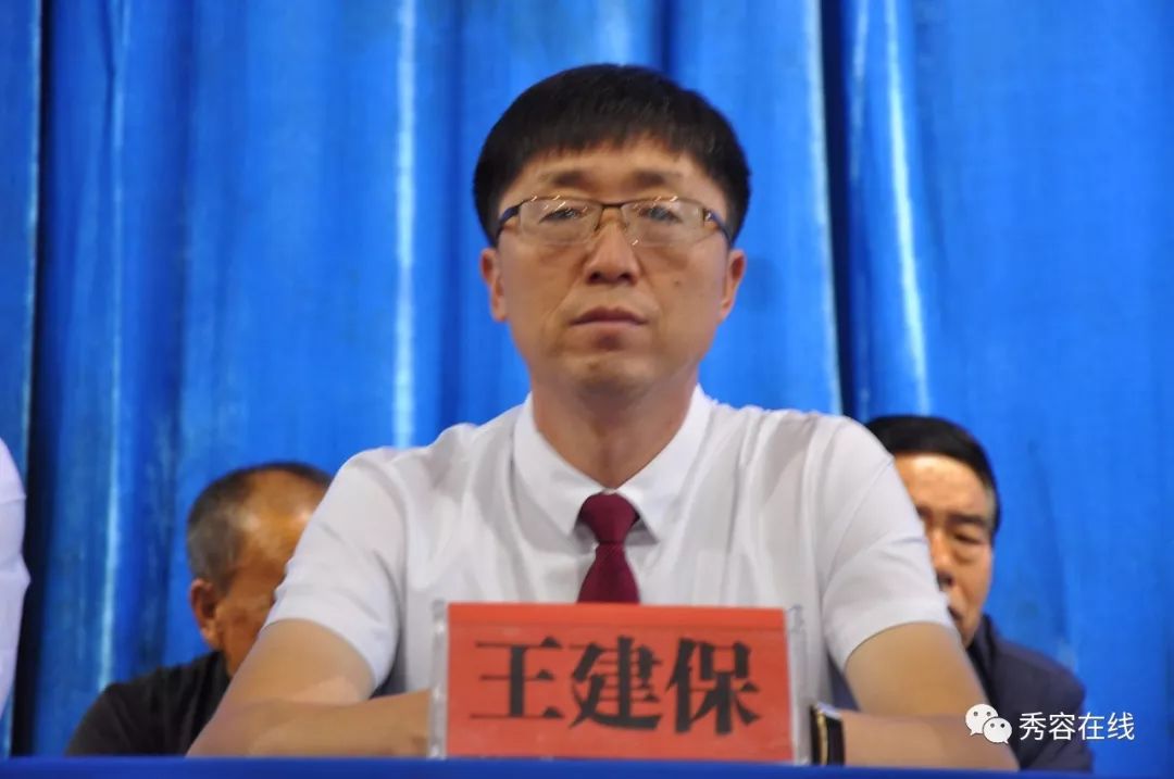 忻州二中党支部书记张晋华,校长于爱和,副校长韩贵平,王建保及中层